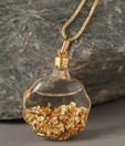 Ziveg Gold Flakes Filled Snazzy Round Bottle Pendant