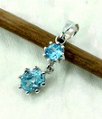 Sizzling Silver Blue Topaz Claw Pendant